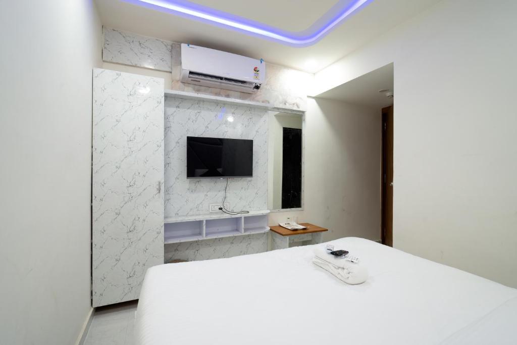 TV a/nebo společenská místnost v ubytování Hotel Nest Sky