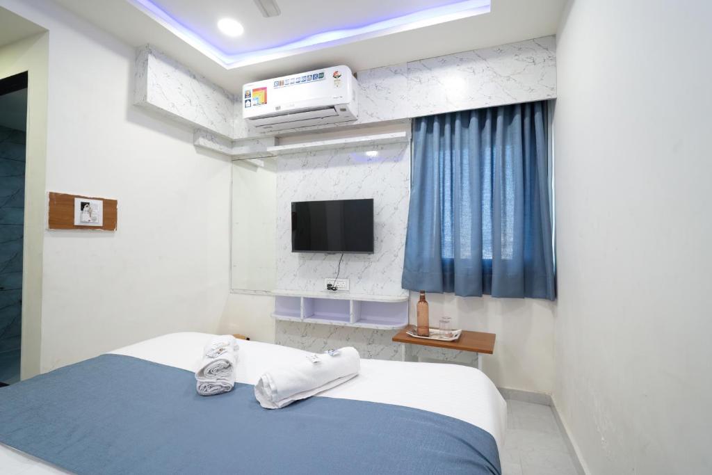 Postel nebo postele na pokoji v ubytování Hotel Nest Sky
