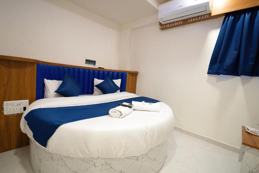 Postel nebo postele na pokoji v ubytování Hotel Nest Sky
