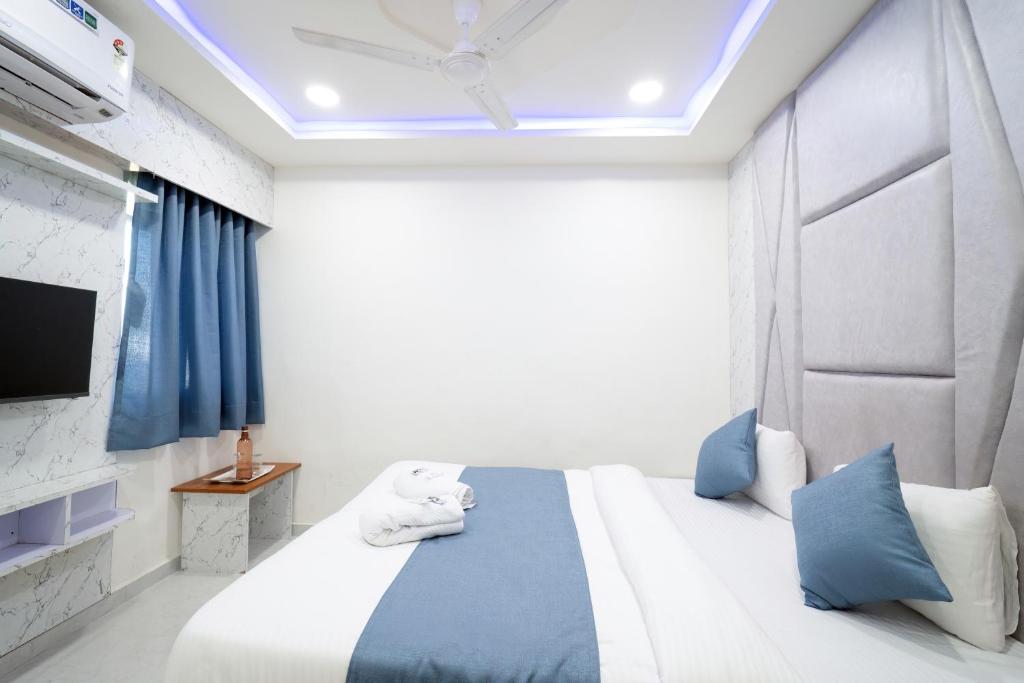 Postel nebo postele na pokoji v ubytování Hotel Nest Sky