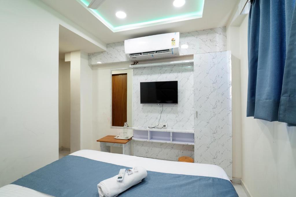 Postel nebo postele na pokoji v ubytování Hotel Nest Sky