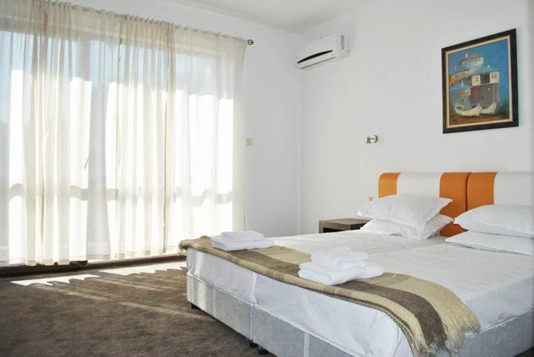 Postel nebo postele na pokoji v ubytování Вила Белисима, Villa Bellissima