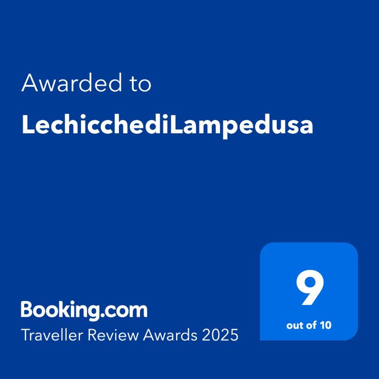 a blue sign with the text awarded to at LechicchediLampedusa in Lampedusa