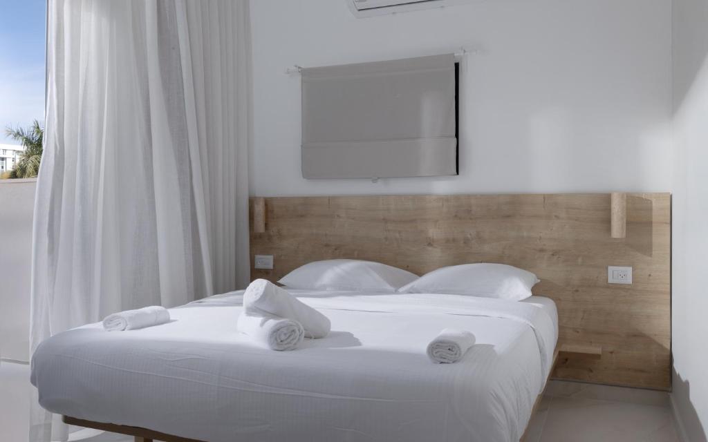 Ein Bett oder Betten in einem Zimmer der Unterkunft אורה דירות אירוח -נץ 9- דירות נופש איכותיות לנופש שקט ואקסלוסיבי