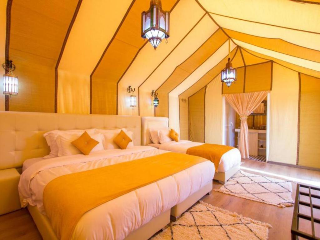 Postel nebo postele na pokoji v ubytování Global Luxury Camp