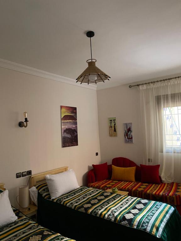 Postel nebo postele na pokoji v ubytování Dyafat Abla
