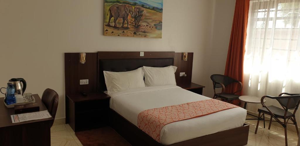 Postel nebo postele na pokoji v ubytování 401 Restaurant & Accommodation
