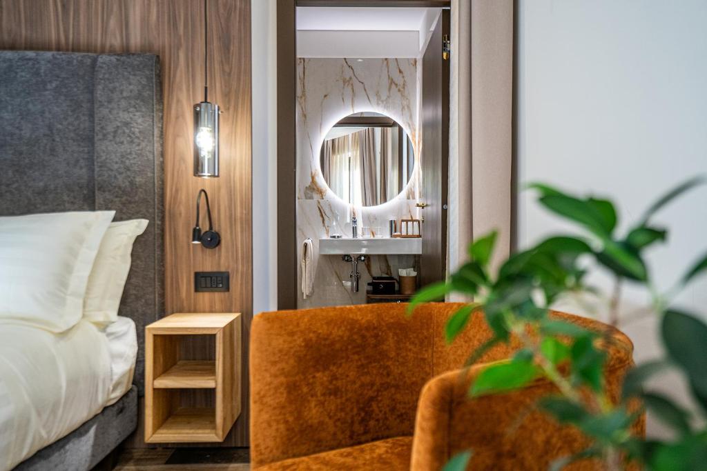 Postel nebo postele na pokoji v ubytování Hotel Iris