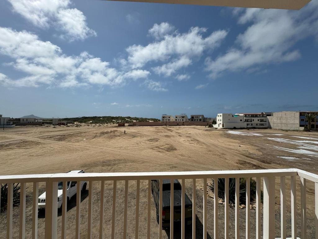 a view of a parking lot with a dirt field at Pedra do Sol Praia Estoril Sal Rei FREE WI-FI in Sal Rei