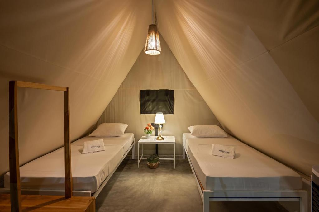 Postel nebo postele na pokoji v ubytování Manram Glamping Weligama