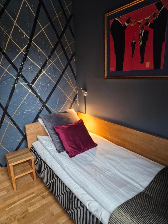 Postel nebo postele na pokoji v ubytování Stora Hotellet Osby