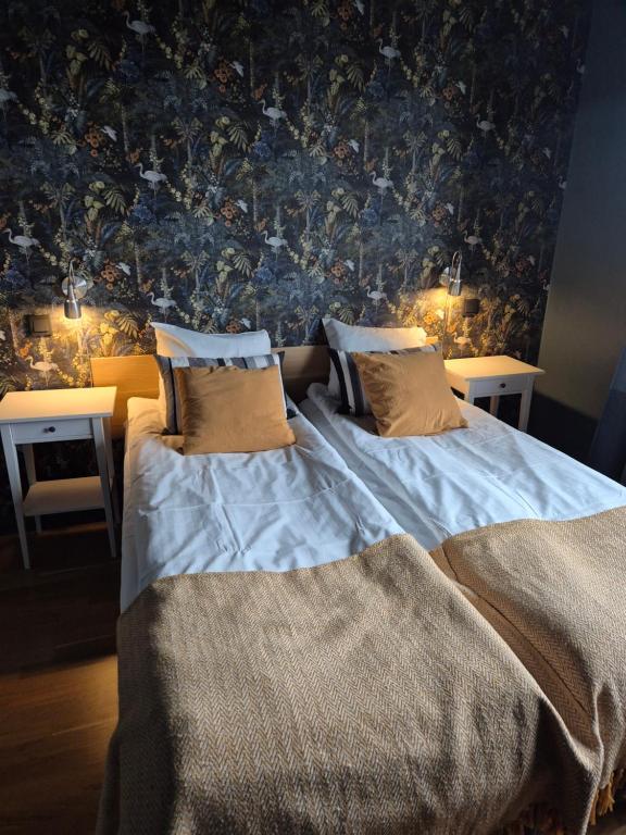 Postel nebo postele na pokoji v ubytování Stora Hotellet Osby