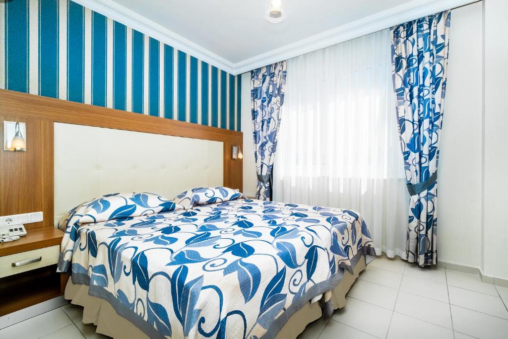 Postel nebo postele na pokoji v ubytování Villa Sunflower Hotel - All Inclusive
