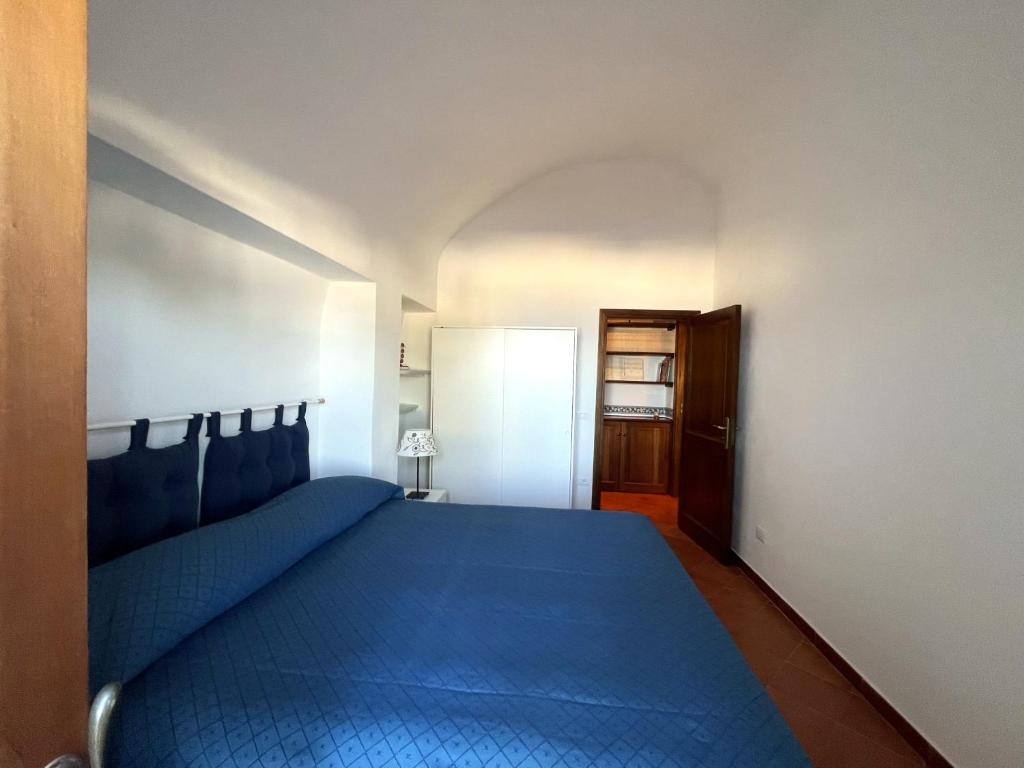 Postel nebo postele na pokoji v ubytování Casa Papuzza e Casa Lucilla