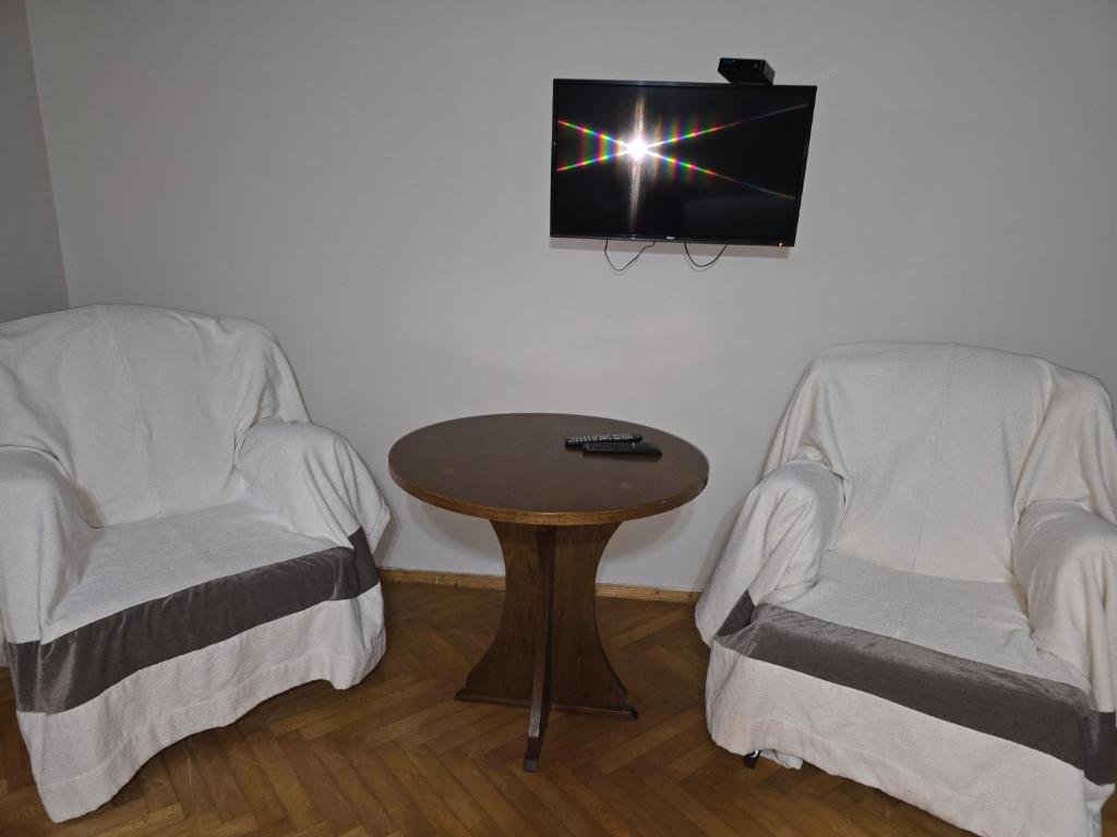 TV a/nebo společenská místnost v ubytování CATTALEYA