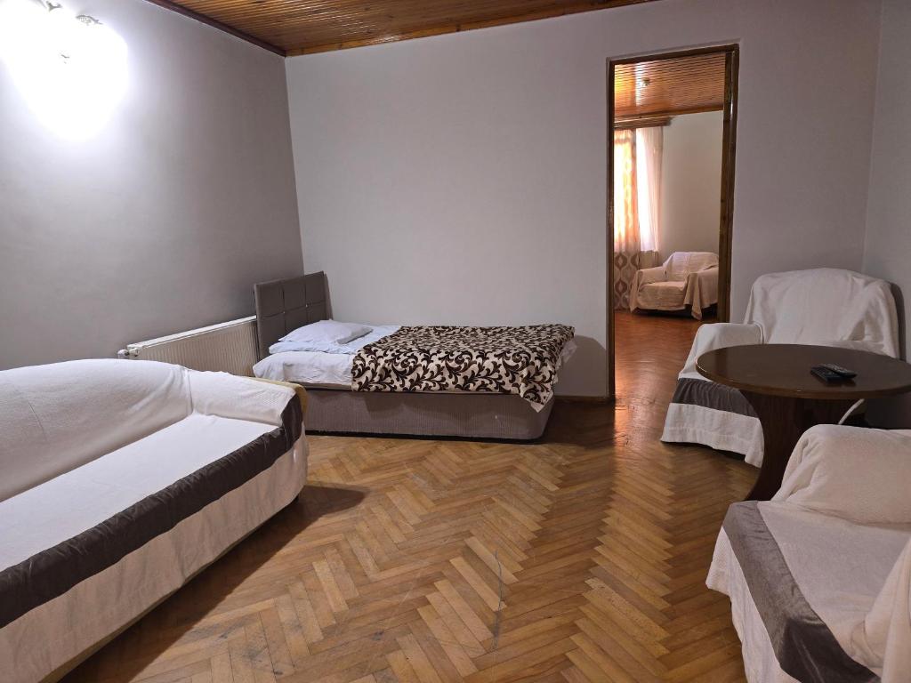 Postel nebo postele na pokoji v ubytování CATTALEYA