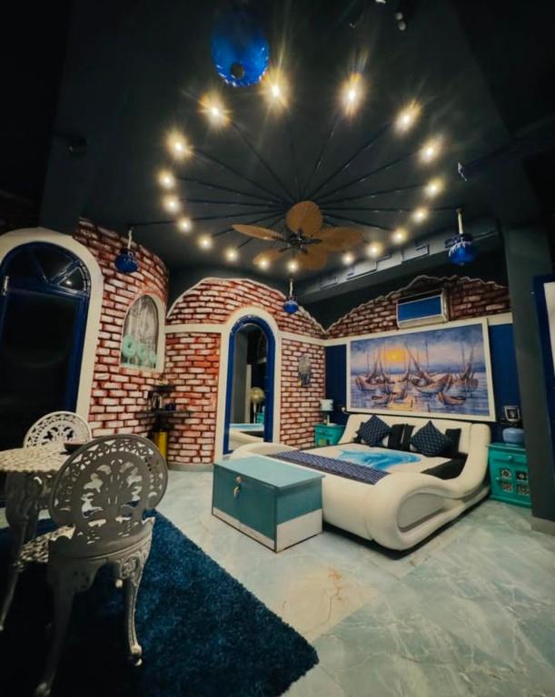 Homestay by the Tea Garden Dibrugarh - Family Room With Balcony