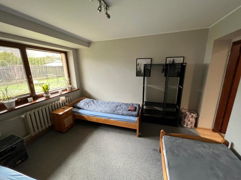 Postel nebo postele na pokoji v ubytování Apartament MATI