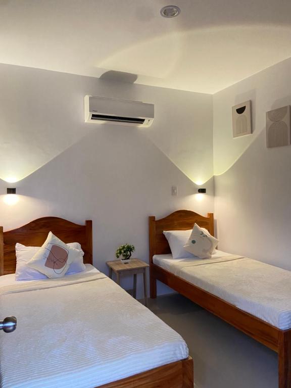 Postel nebo postele na pokoji v ubytování Salamya Guesthouse