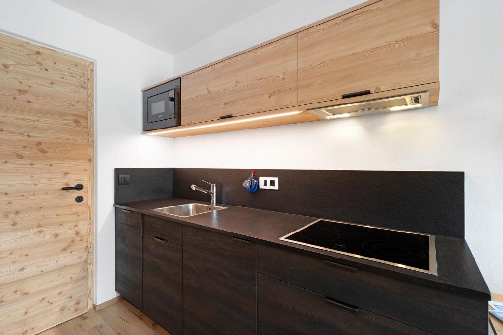 Kuchyň nebo kuchyňský kout v ubytování Pfaffingerhof Antholz