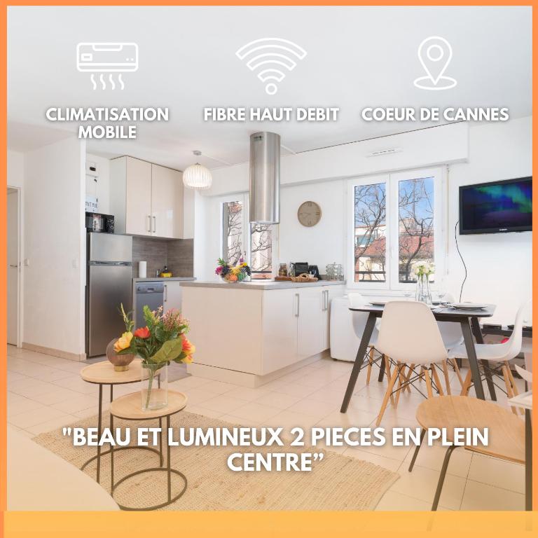 une cuisine blanche avec une table et une salle à manger dans l'établissement Le Calmette By ApiRent #Central #Lumineux #Calme #Wifi, à Cannes