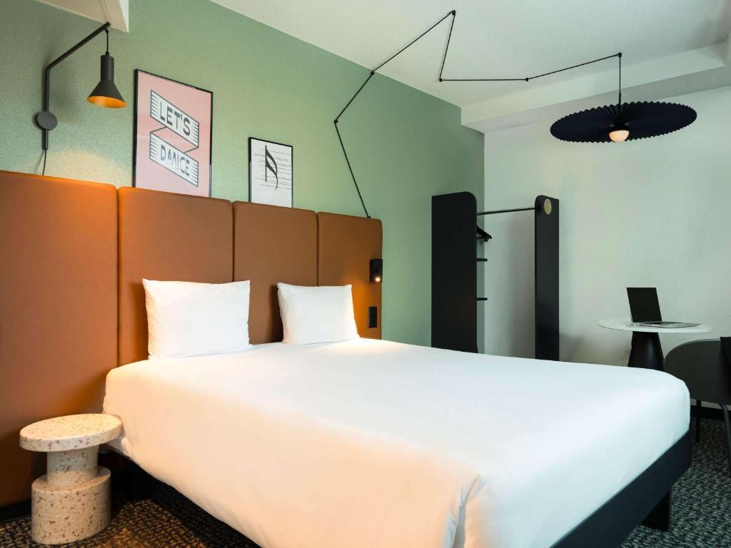 Postel nebo postele na pokoji v ubytování ibis Lausanne Centre
