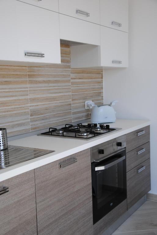 Kuchnia lub aneks kuchenny w obiekcie TD Sesto Piano with Sea View Living Terrace