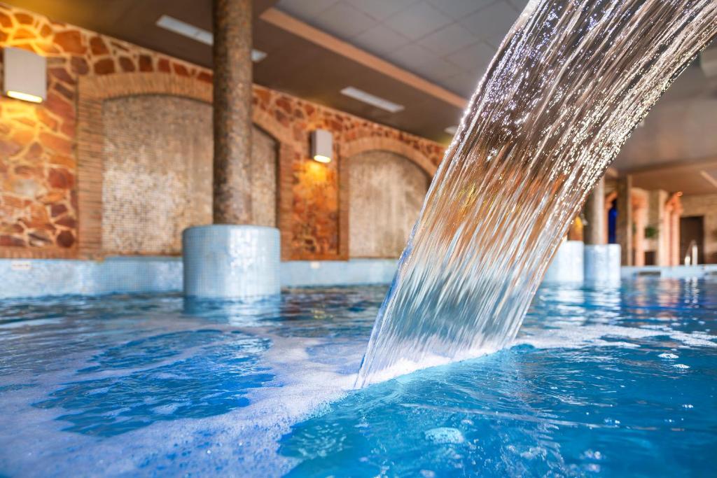 The swimming pool at or close to Hotel La Caminera Club de Campo