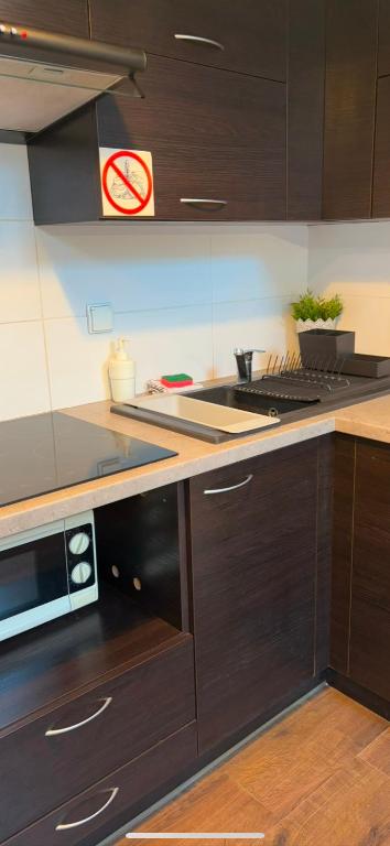 Kuchyňa alebo kuchynka v ubytovaní Apartament Szafir 4b
