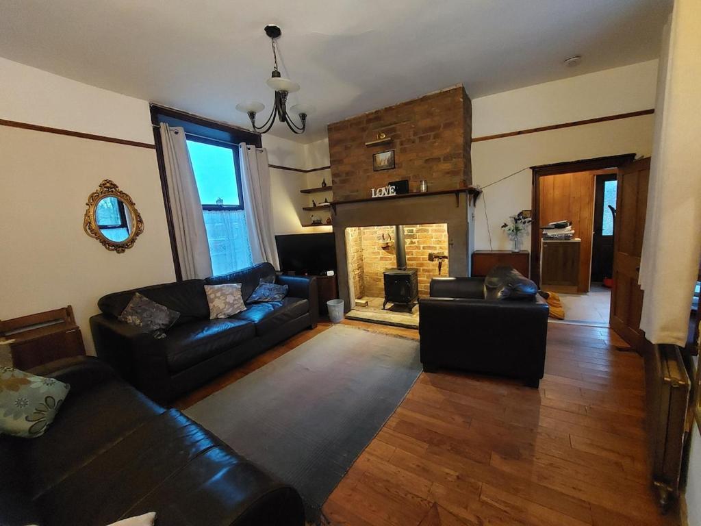 Χώρος καθιστικού στο Relax at the Cosy Snug Glossop