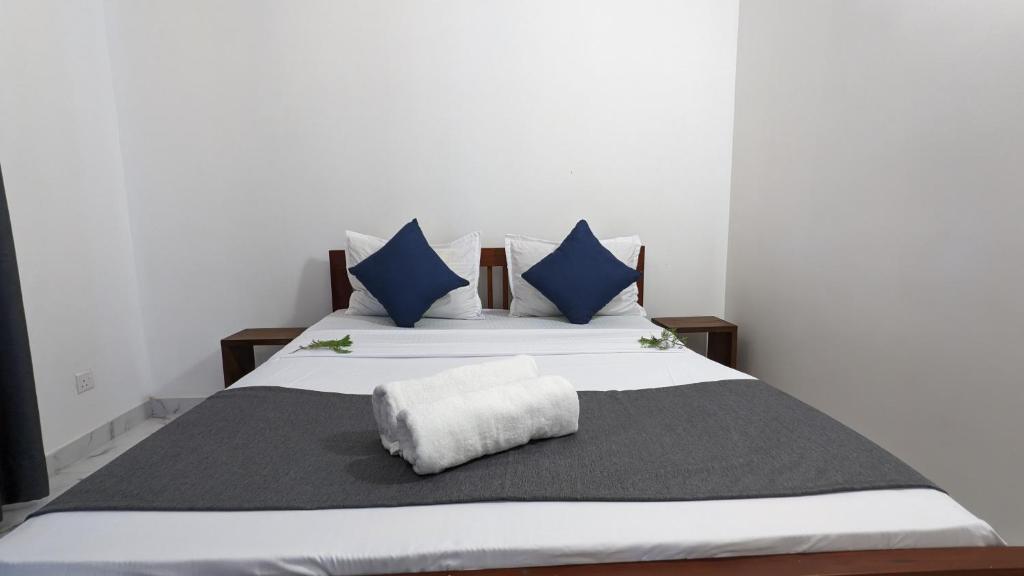 Postel nebo postele na pokoji v ubytování Bellezza Home stay