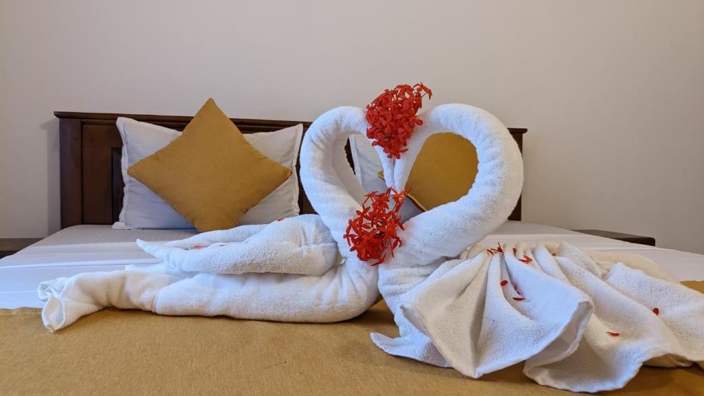 Postel nebo postele na pokoji v ubytování Bellezza Home stay