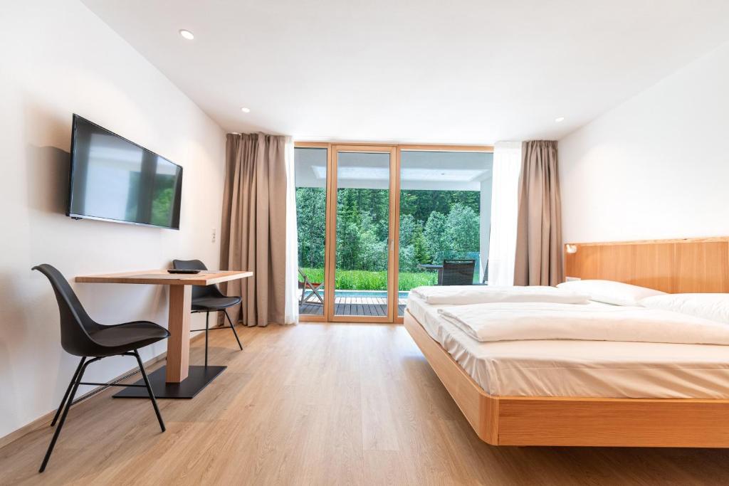Postel nebo postele na pokoji v ubytování Apartments Greva 2