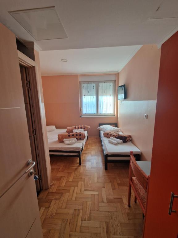 Ένα ή περισσότερα κρεβάτια σε δωμάτιο στο Bed and Breakfast Turist