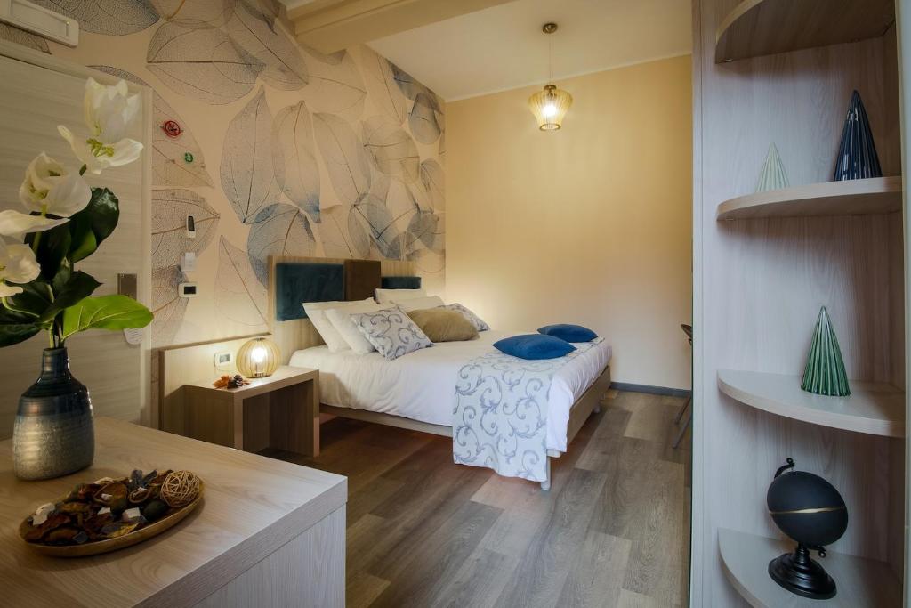 Postel nebo postele na pokoji v ubytování Aiem B&B