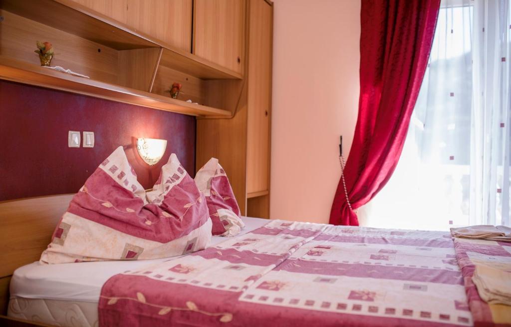 Postel nebo postele na pokoji v ubytování Apartments Gordana
