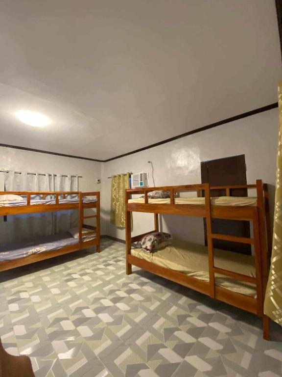 Postel nebo postele na pokoji v ubytování 4A's Lodging
