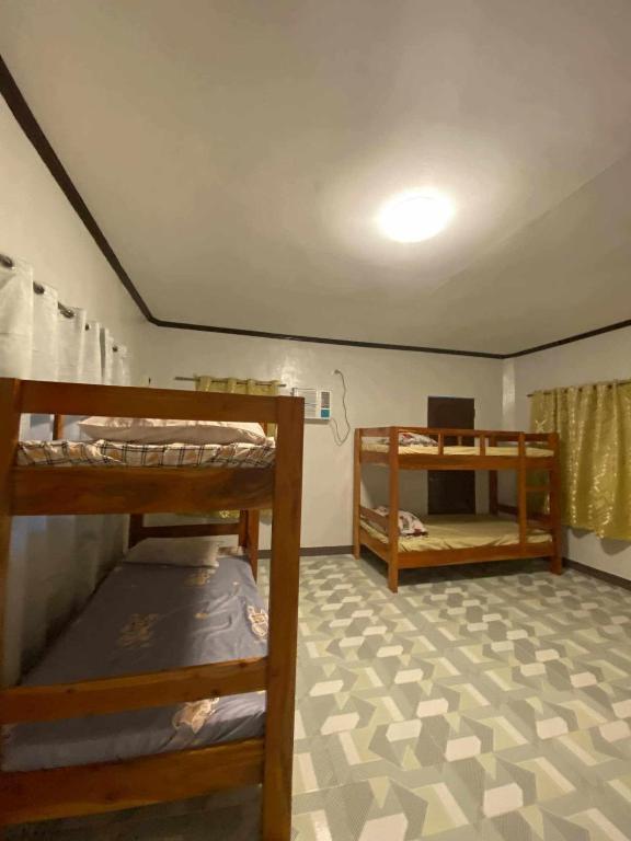 Postel nebo postele na pokoji v ubytování 4A's Lodging
