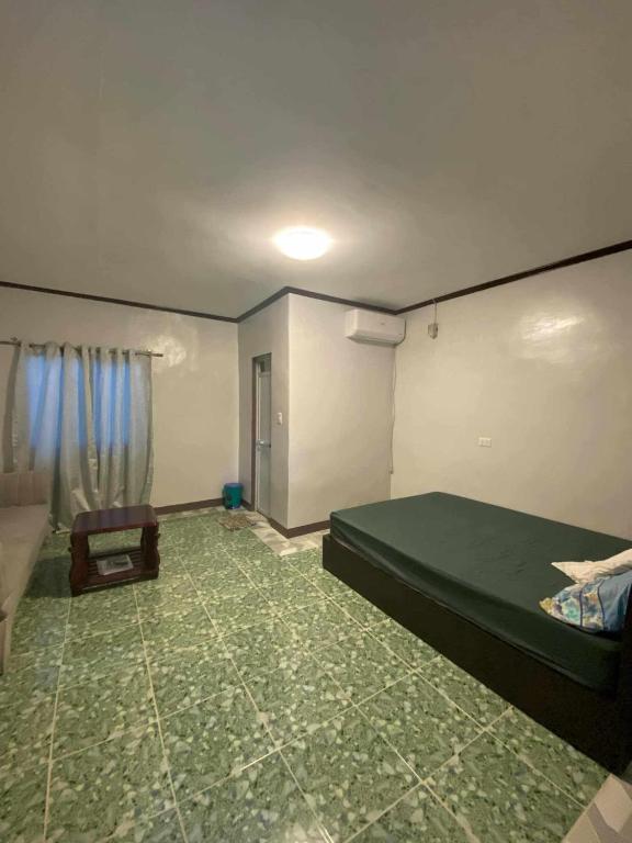 Postel nebo postele na pokoji v ubytování 4A's Lodging