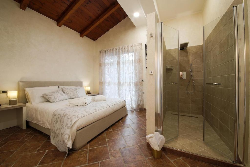 Postel nebo postele na pokoji v ubytování Aiem B&B