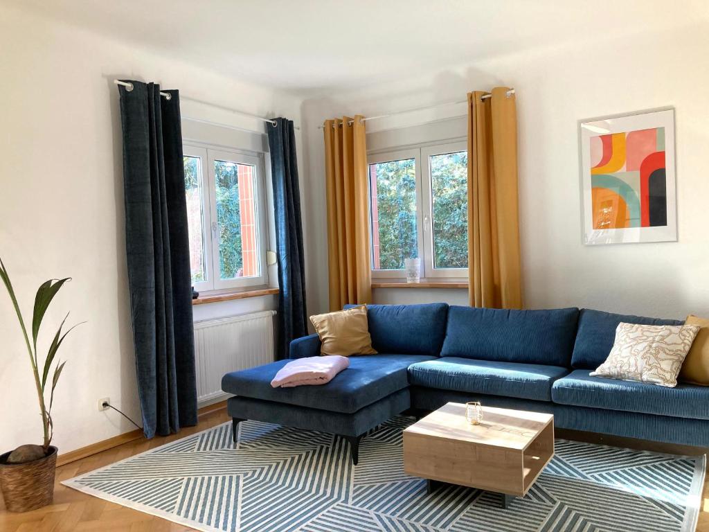 Posezení v ubytování Gemütliche Wohnung in unmittelbarer Nähe zum See