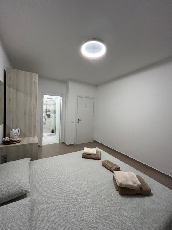 Postel nebo postele na pokoji v ubytování *Veranda's rooms* - Free parking in central Lugano
