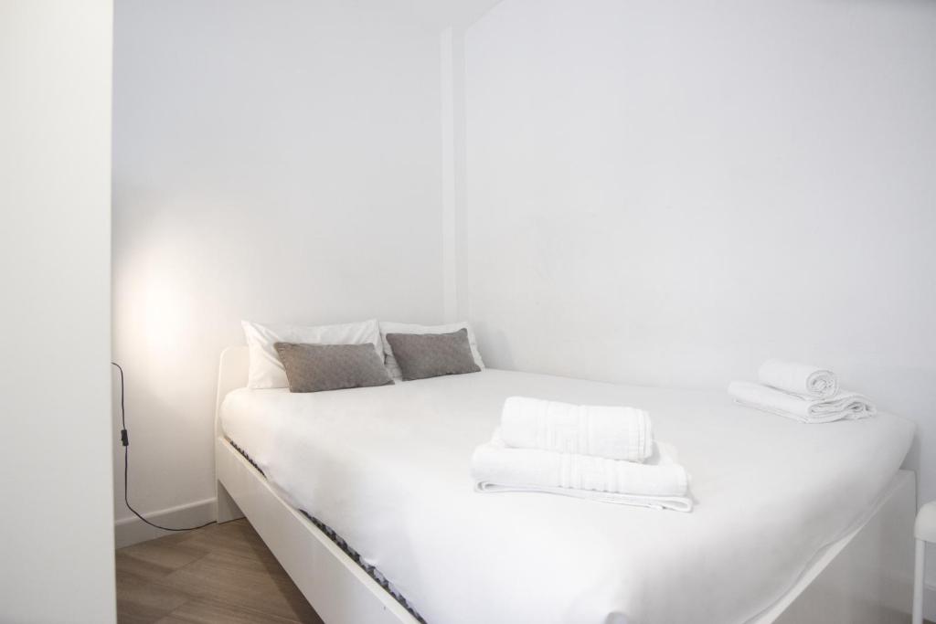 Posteľ alebo postele v izbe v ubytovaní RentalSevilla Santa Rufina