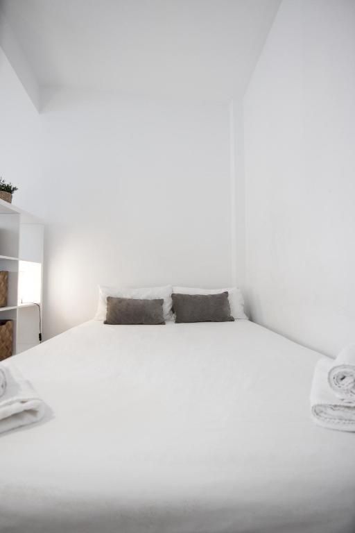 Posteľ alebo postele v izbe v ubytovaní RentalSevilla Santa Rufina