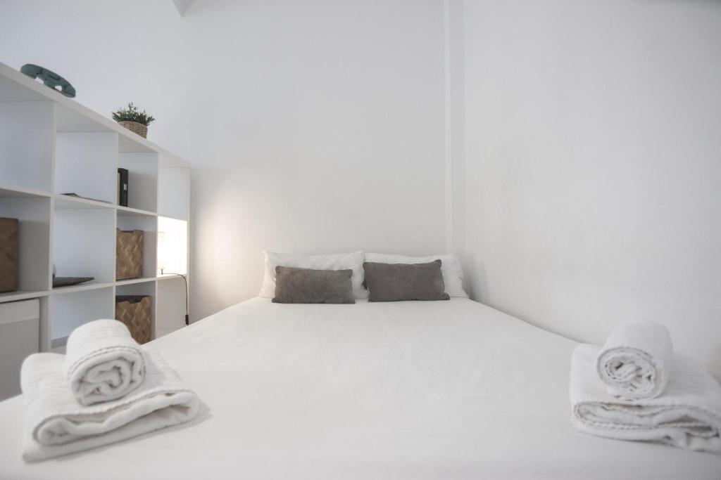 Posteľ alebo postele v izbe v ubytovaní RentalSevilla Santa Rufina