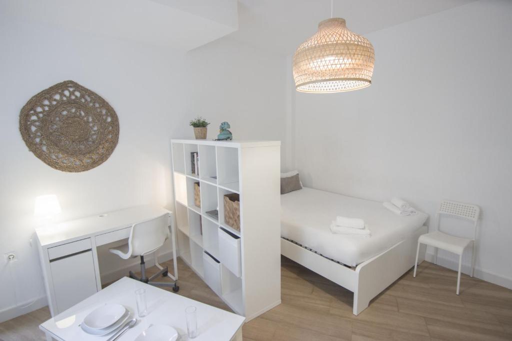 Posteľ alebo postele v izbe v ubytovaní RentalSevilla Santa Rufina