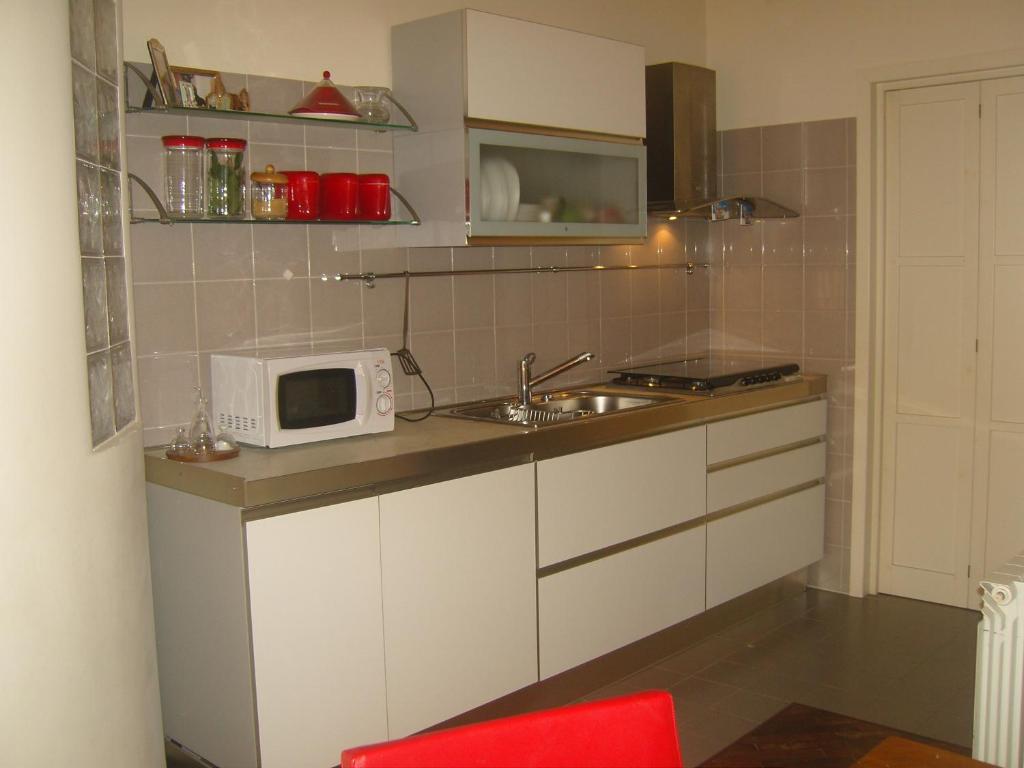 Casa Via Magenta tesisinde mutfak veya mini mutfak