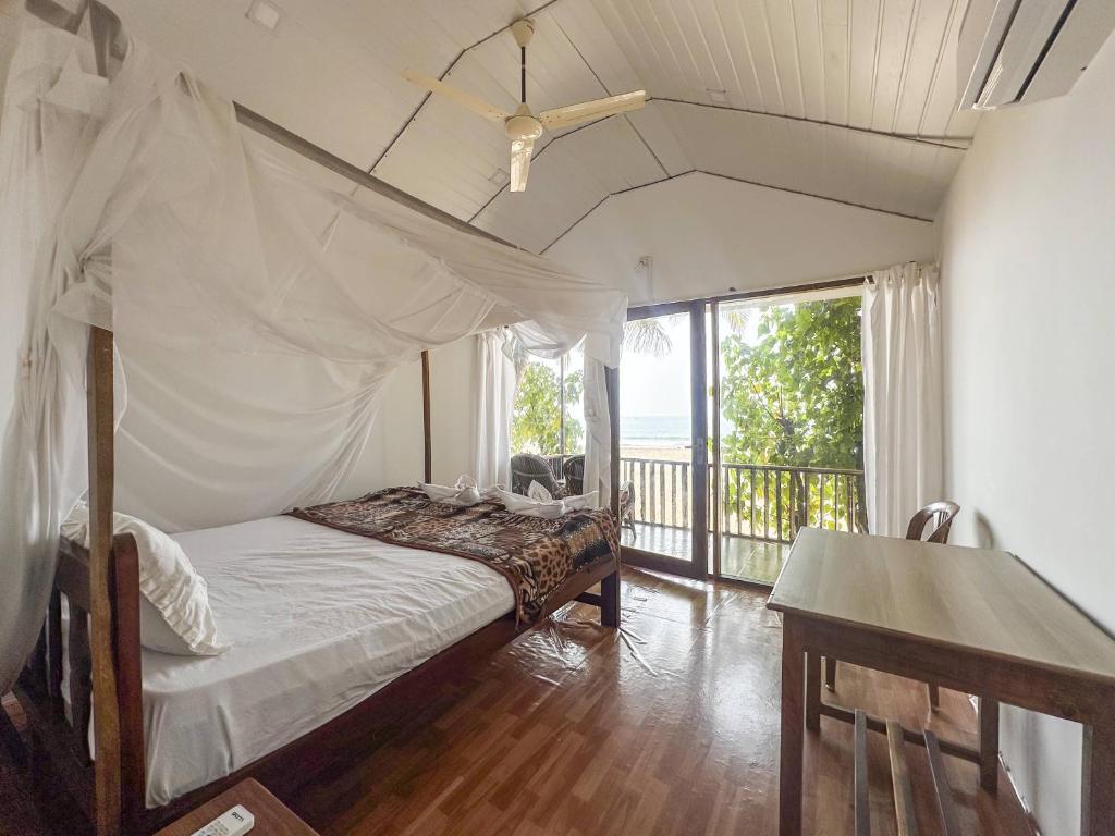 Una cama o camas en una habitación de Costantina - Agonda Beach