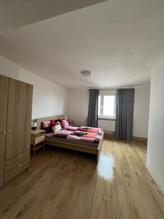 Postel nebo postele na pokoji v ubytování City Center Apartments - Moderna Brno Římské náměstí V