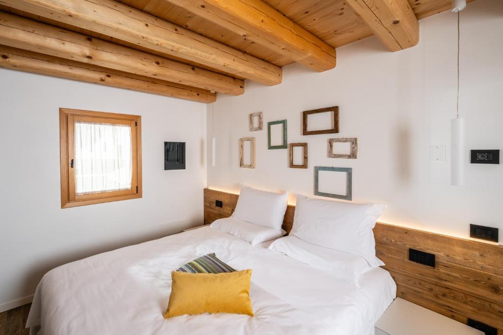 Postel nebo postele na pokoji v ubytování Borgo Paolin - Camere in vigna